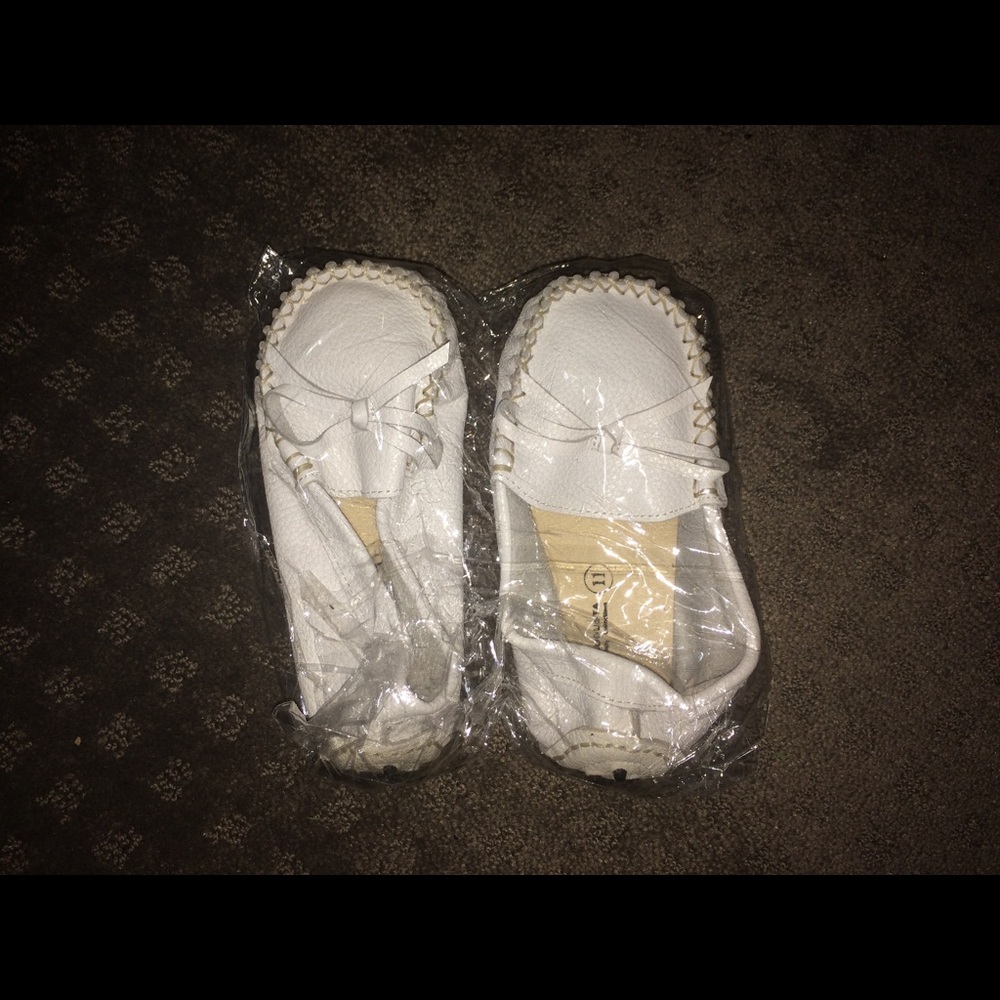 Brand new white Moccasins size 11